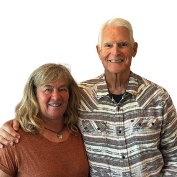 Tracy and John R. with their sold sign